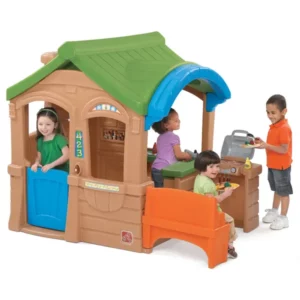 two boys and two girls playing in a playhouse