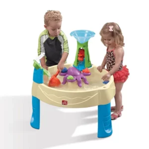 boy and girl playing with a whirlpool water table