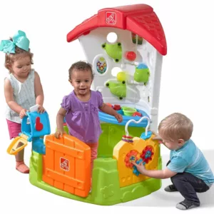 three toddlers playing in a corner house