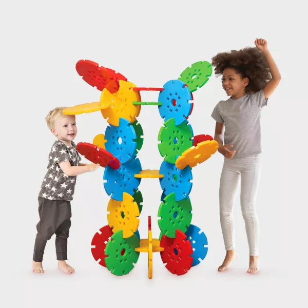 boy and girl play with educational wheels