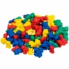 A large pile of colorful plastic counting bears in red, yellow, blue, and green, used for early math learning and sorting activities.