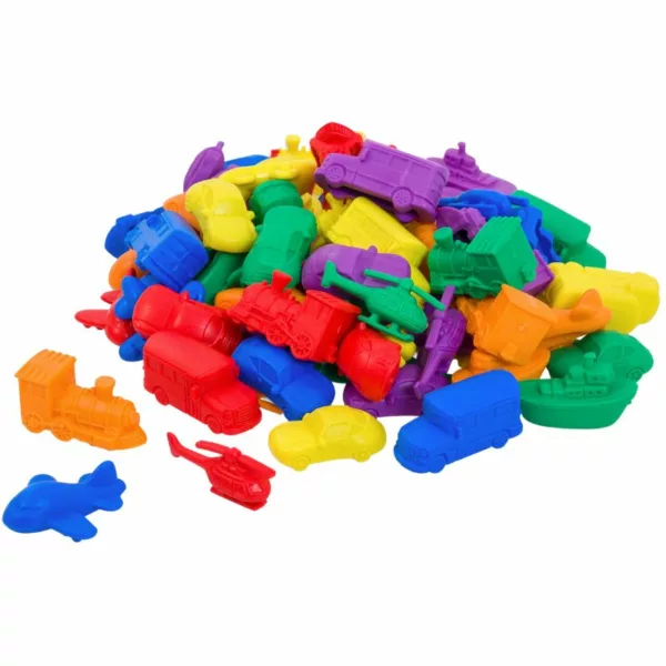 A colorful assortment of plastic transportation counters in various vehicle shapes, including cars, buses, airplanes, boats, trains, and helicopters.