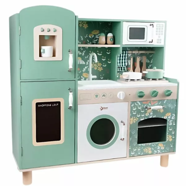 A wooden toy kitchen set in pastel green and white colors with floral-patterned accents. The set includes a refrigerator with a pretend water dispenser, a microwave, a sink with a faucet, stove burners with pots and utensils, an oven, a washing machine, and a chalkboard.