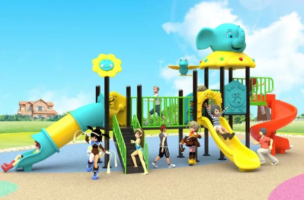 Colorful outdoor playground with slides, climbing structures, and fun decorations including an elephant figure, surrounded by children playing actively.