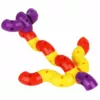 An assembled bird-like creation with colorful curved plastic building blocks in red, blue, yellow and purple colors