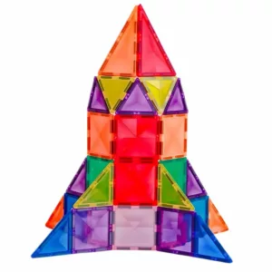 A colorful rocket ship built from magnetic tiles in various shapes and bright colors, including red, blue, green, yellow, orange, and purple.