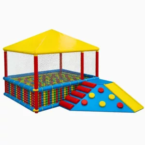 Colorful children’s indoor soft play structure with a ball pit, climbing steps, padded obstacles, and yellow slide under a yellow canopy