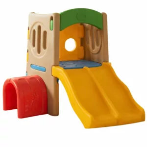 Colorful plastic children's playground with a yellow double slide, red tunnel, climbing panels, and enclosed play area.